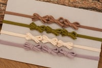 Image 6 of Three Bow Stretch Tieback 