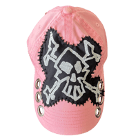 Image 1 of evil pink crossbones hat