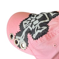 Image 4 of evil pink crossbones hat