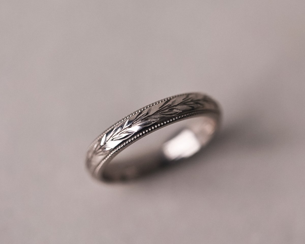 Image of 18ct White gold 4mm ‘Olive leaf’ and milled edge engraved ring