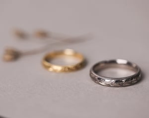 Image of 18ct White gold 4mm ‘Olive leaf’ and milled edge engraved ring