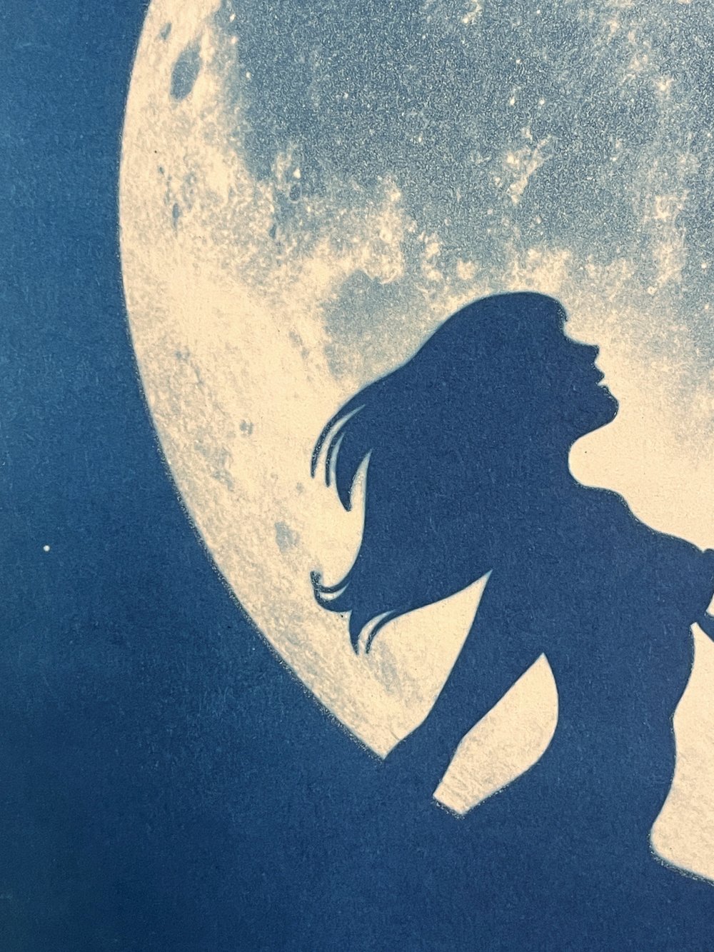 Image of "La Fesse Cachée de la Lune" phosphorescent cyanotype  