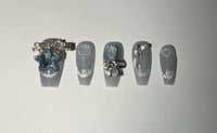 Image 1 of LONG COFFIN ICY BLUE CATEYE HELLO KITTY AND BOWS CHARM NAILS