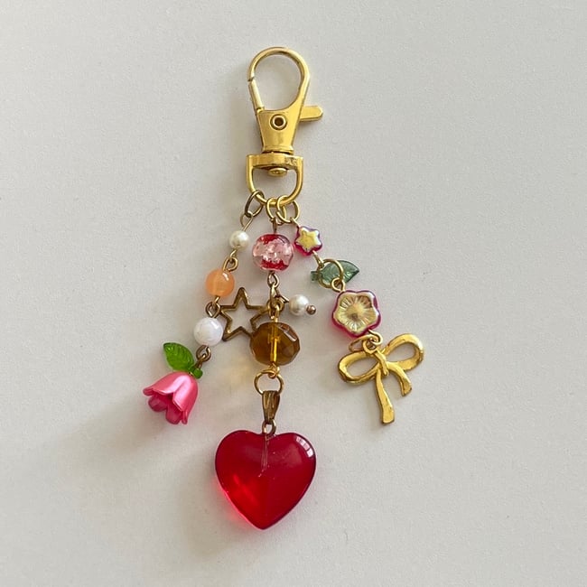rustic red ruby and lily gold bow keychain