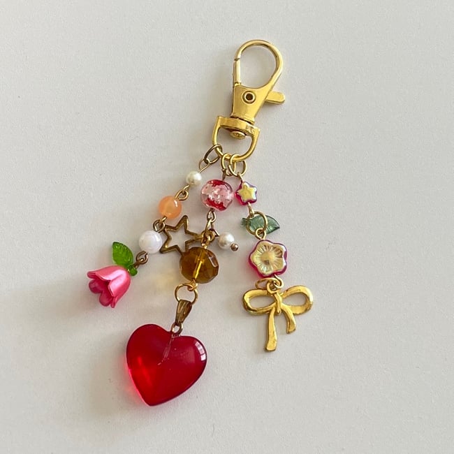 rustic red ruby and lily gold bow keychain