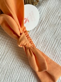 Image 2 of Bandeau Léontine - Corail / Terracota / fleuri pâquerette 