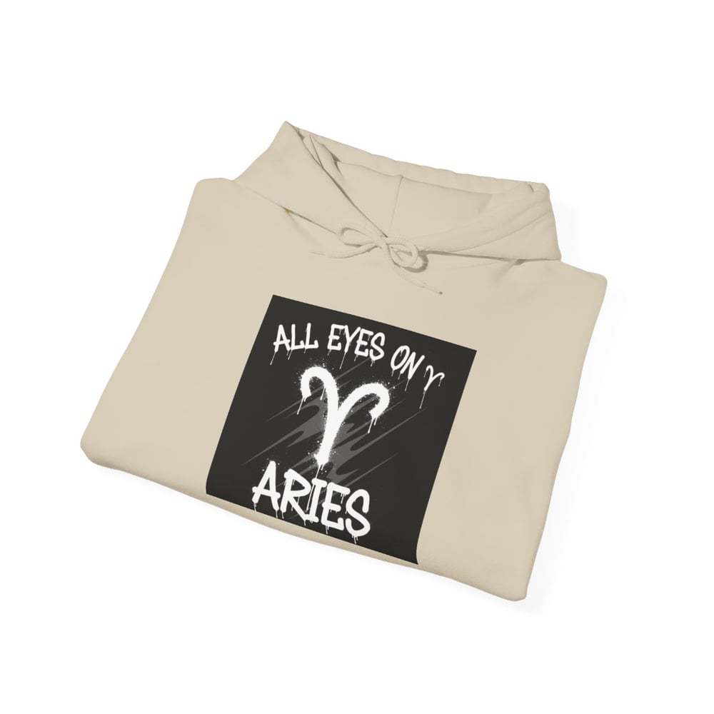 Image of Unisex Aries Zodiac Hoodie — "All Eyes On Aries" Astrology Pullover