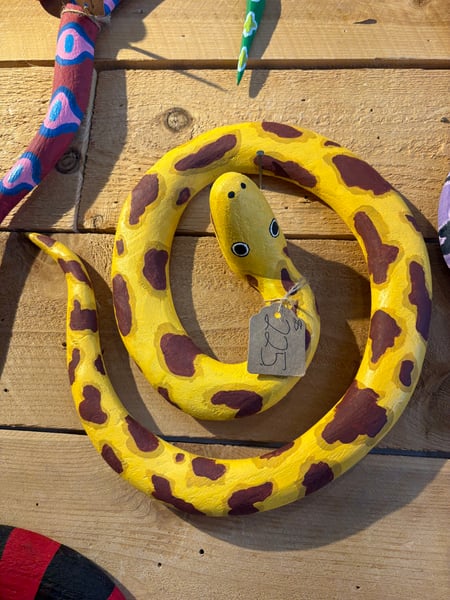 Image of Yellow swirl snake 