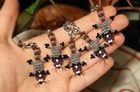 Image 3 of Raccoon charm