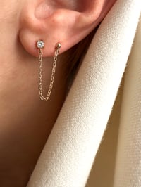 Image 1 of Boucle d'oreille ATTRAYANTE