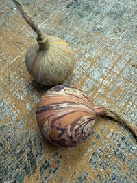 Image 2 of 2 x Round wooden hand marbled baubles 