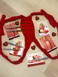 Image 1 of Worn red body stocking and signed 4x6s