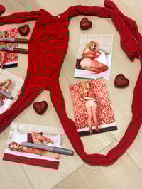 Image 2 of Worn red body stocking and signed 4x6s
