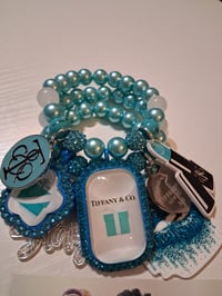 Image 2 of Tiff with blue sparkles 