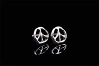 Image 3 of Melting Peace Studs 