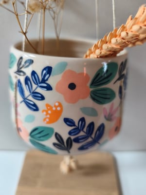 Image of   Pot suspendu fleur rose
