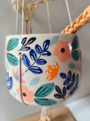 Image of   Pot suspendu fleur rose