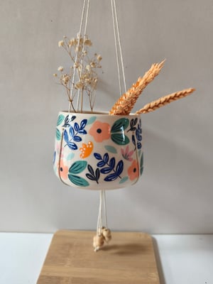 Image of   Pot suspendu fleur rose