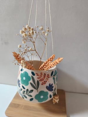 Image of   Pot suspendu fleur bleue 