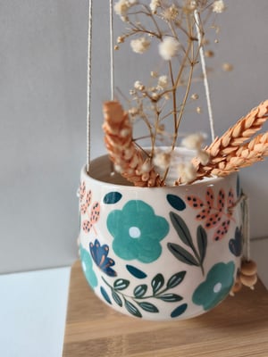 Image of   Pot suspendu fleur bleue 