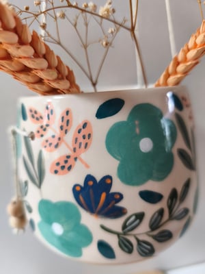 Image of   Pot suspendu fleur bleue 