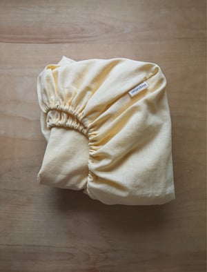 Image of linen fitted bedsheet