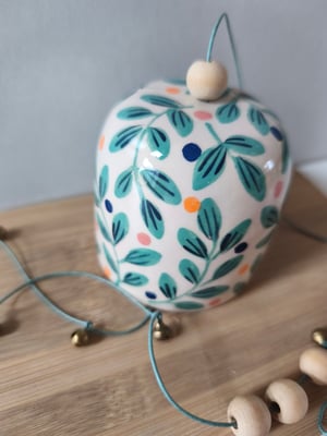 Image of  Cloche à suspendre feuillage turquoise 