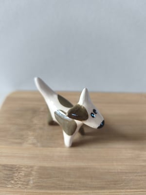 Image of  Petit chien brun marron 