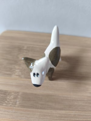 Image of  Petit chien brun marron 