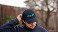 Image 2 of SWEPT TO SEA LOGO CAP - BLACK WITH TEAL EMBROIDERY 