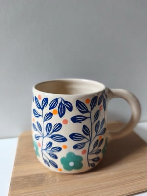 Image of  tasse anse feuillage bleu foncé 