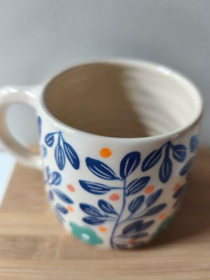 Image of  tasse anse feuillage bleu foncé 