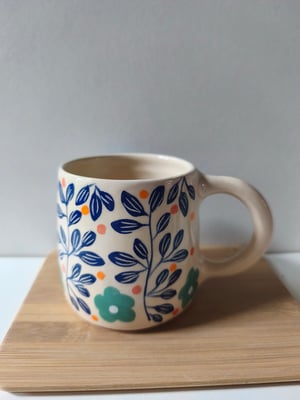 Image of  tasse anse feuillage bleu foncé 