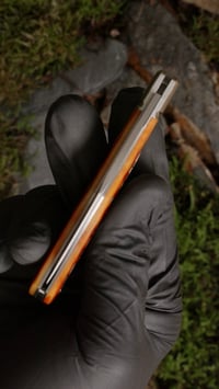 Image 4 of Remington 1306 pattern lockback folder in amber jigged bone