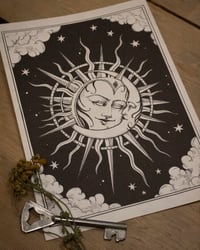 Image 1 of Sun/moon