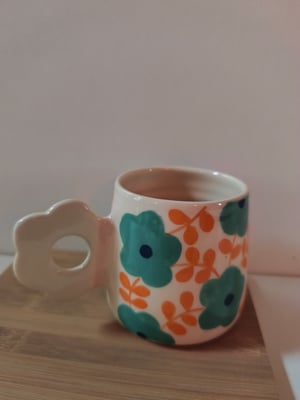 Image of    tasse anse fleur bleu turquoise 