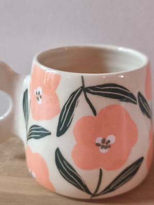 Image of    tasse anse fleur rose clair 