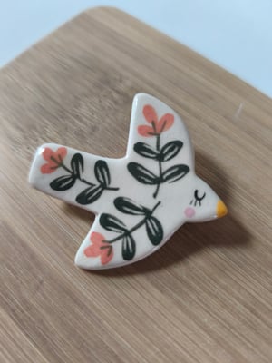 Image of Broche oiseau fleur rose 