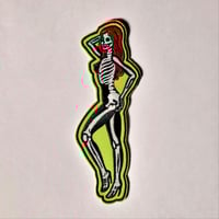 Image 1 of Green Glow In The Dark Skeleton Red-Head Embroidered Patch With A Merrowed Edge