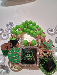 Image 1 of Green Guc