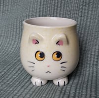 Image 1 of Innocent Cream Speckle Kitty Mug