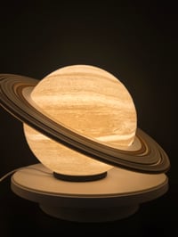 Image 1 of Saturn lamp with moveable rings