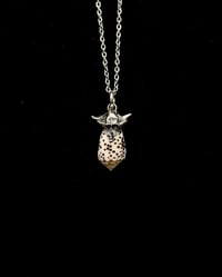 Flea Cone Pendant w/ Coral Skull Cap