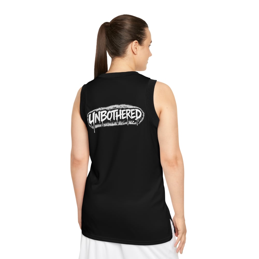 Image of Basketball Jersey — 'Talked About by Many, Confronted by None' Graphic