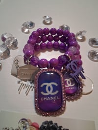 Image 1 of Pop in purple w Cc