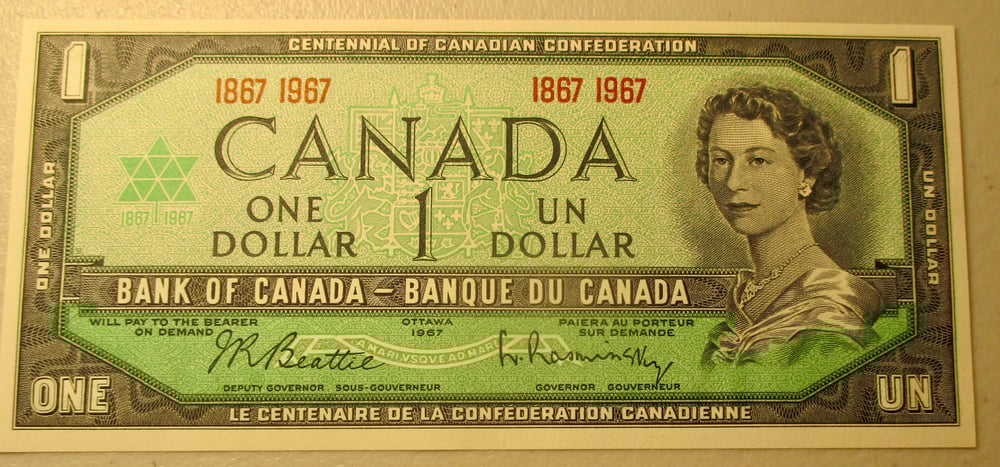 GEM CRISP UNCIRCULATED 1967 CENTENNIAL COMMEMORATIVE CANADA DOLLAR FROM A ROYAL MINT PACKAGE