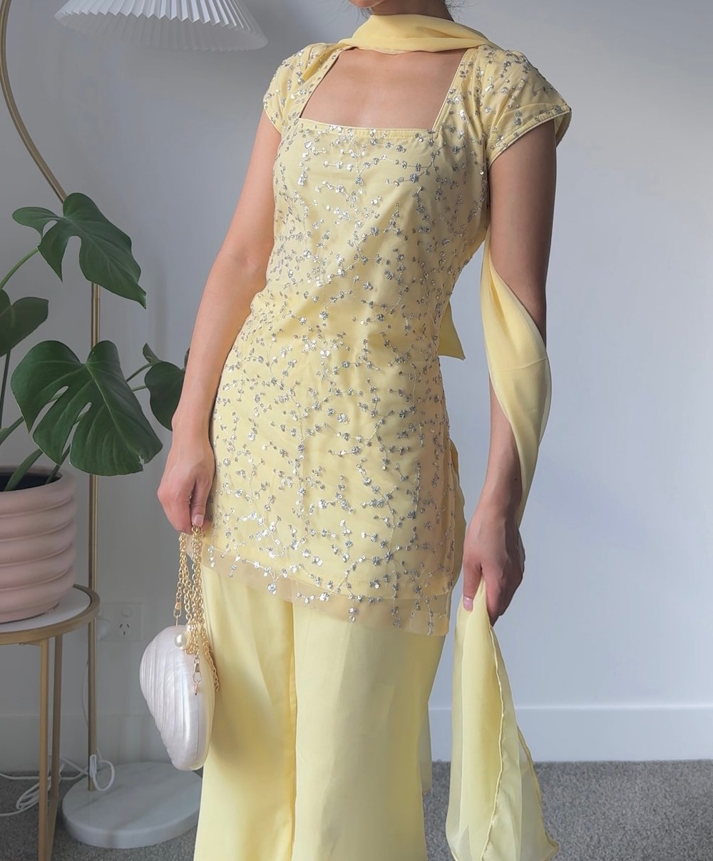 Image of Pastel yellow three piece kurti set 