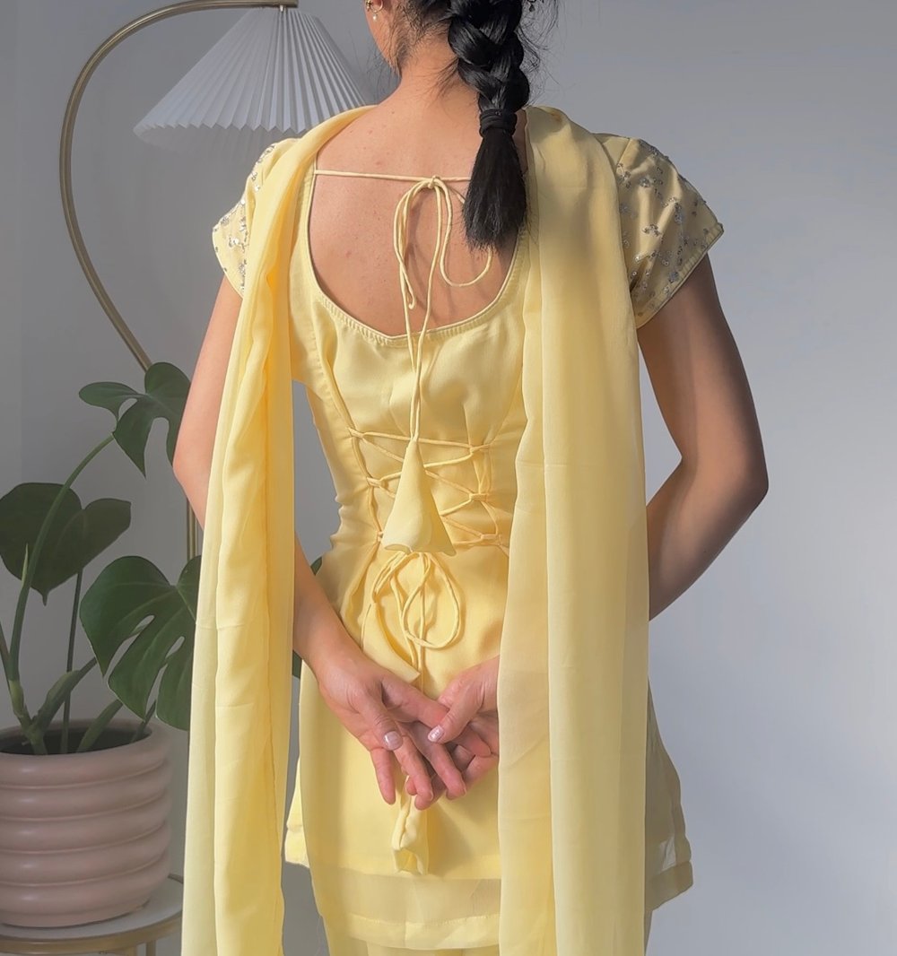Image of Pastel yellow three piece kurti set 