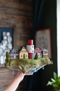 Image 1 of Town with a lighthouse
