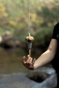 Image 2 of How to spin on a drop spindle video